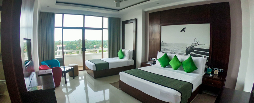 A deluxe room at North Gate by Jetwing